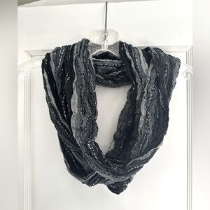 4/$20 DEAL ON SCARF BUNDLES!
Vanity Chic Black and Gray Textured Infinity Scarf
